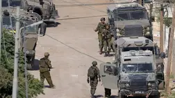 Izraeli katonák a Ciszjordánia északi részén fekvő Dzsenín város menekülttáborában hetedik napja zajló hadművelet során 2024. szeptember 3-án. (Fotó: MTI/EPA/Alaa Badarneh)