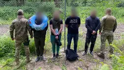 Négy férfit fogtak el a kárpátaljai határőrök a Tisza közelében. Fotó: Ukrán Állami Határőrszolgálat