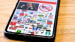 Tippek, hogy milyen vállalatokat bojkottáljanak a vámháború miatt / Fotó: Hans Lucas via AFP