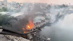 Herszon: támadás miatt: a megrongált hídon túl lakók evakuálását sürgetik / Fotó: Anadolu via AFP