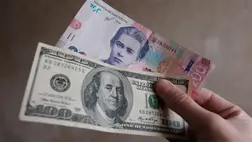 Ukrán hrivnya és amerikai dollár. Fotó: rbc.ua