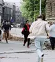 Fedezékbe futó emberek Szarajevóban 1992. július 12-én. Fotó: Pascal Guyot / AFP